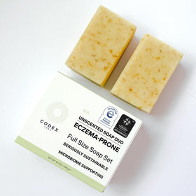 Codex Labs ingredients display with shea butter and olive oil showcasing nourishment