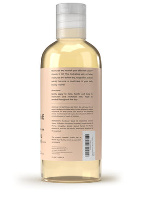 Coera bottle pouring oil into hand, demonstrates easy dispensing and control