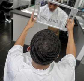COLDLABEL lifestyle shot with wave cap and brush showcasing styling routine benefit