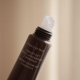 Colleen Rothschild stick with cap off demonstrating easy direct application benefit