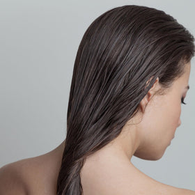 Colleen Rothschild in-shower application showing detangling and easy rinse benefit