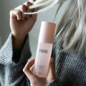 COLLEEN ROTHSCHILD smoothing flyaways on dry hair to tame frizz and add shine