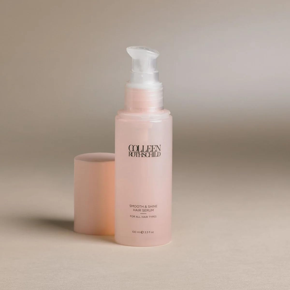 COLLEEN ROTHSCHILD applying serum to mid-lengths for smoother, more manageable hair