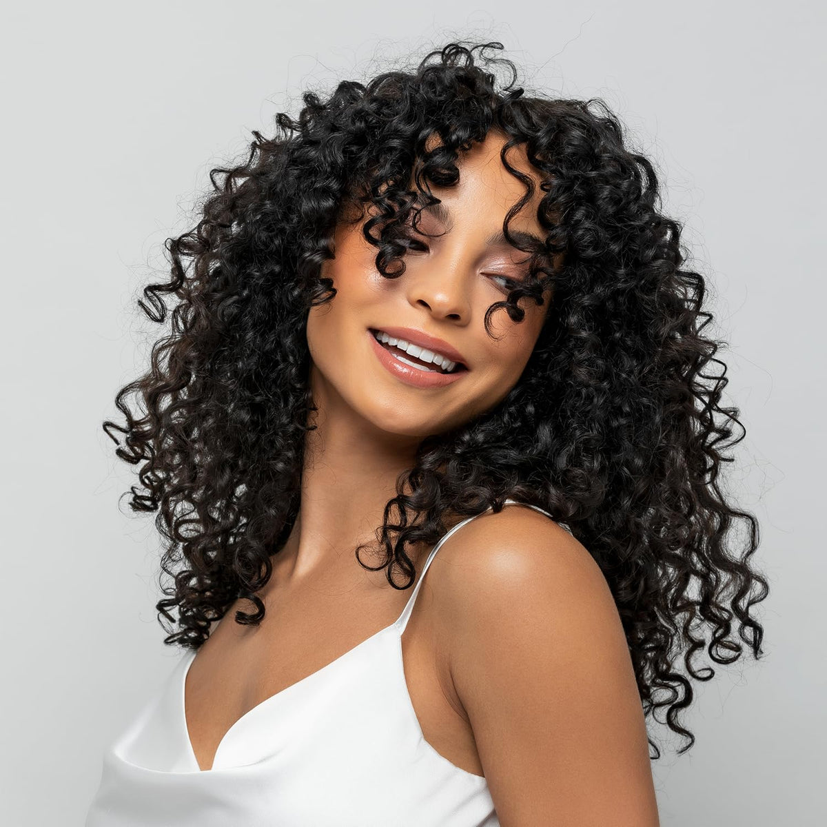 Color Edge texture close-up showing creamy weightless gel-oil for hydrated curls