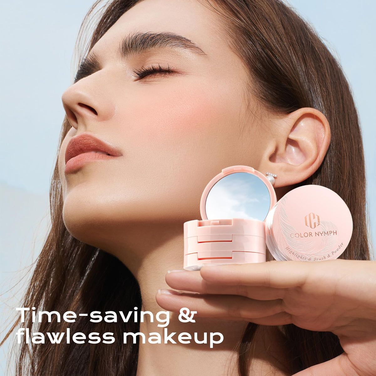 Color Nymph compact in hand to demonstrate small travel-friendly size