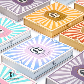 Color Nymph lip glosses array displaying glossy color options