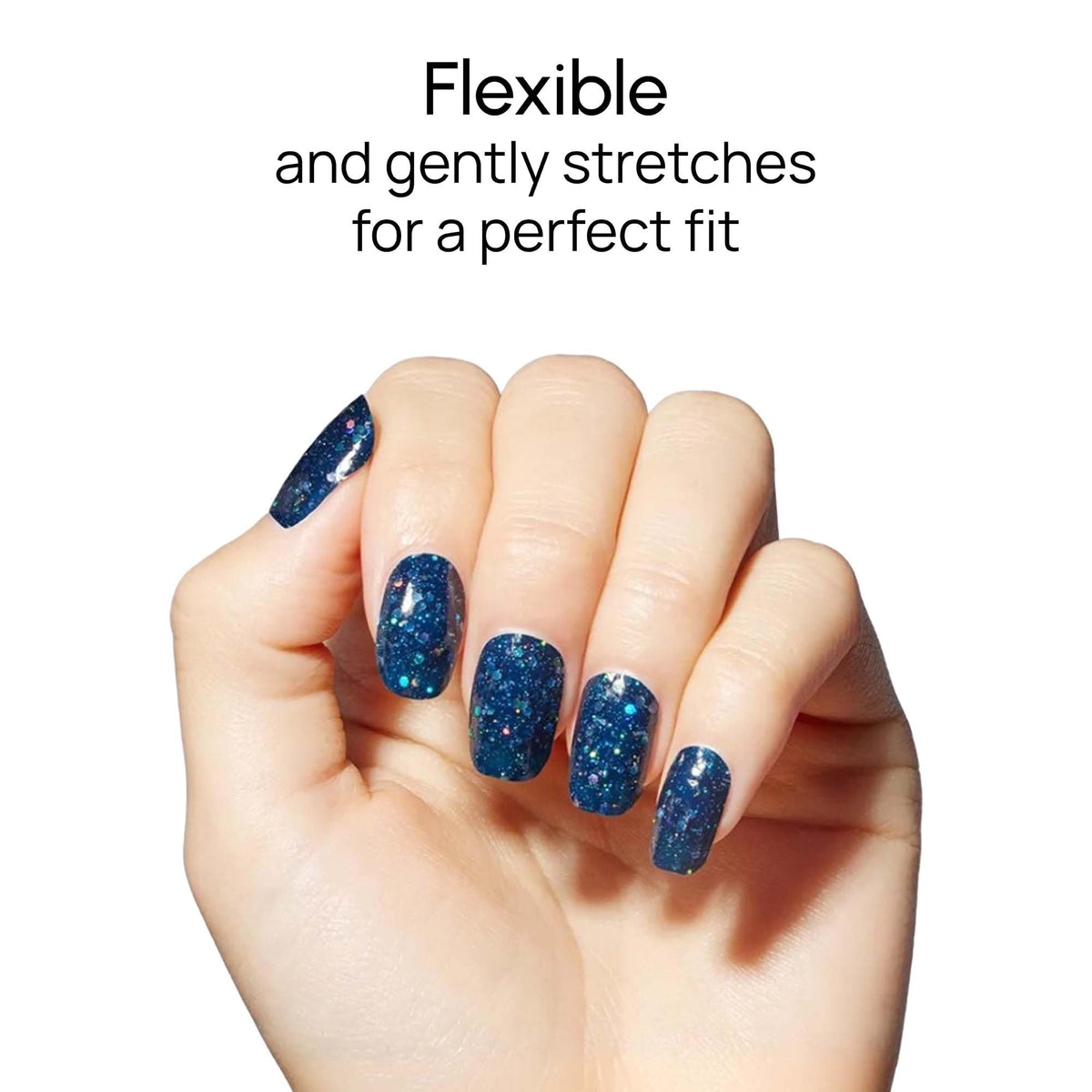 Color Street Oceans Apart on model hands demonstrating dramatic navy glitter look
