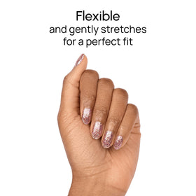 Color Street next to coin for scale showing accurate sizing for nails