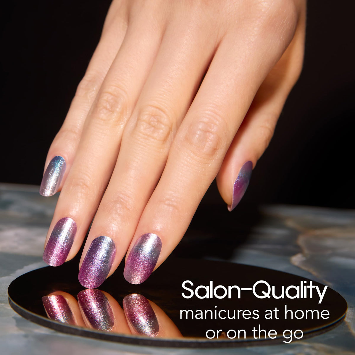 Color Street strip being applied to nail demonstrating quick peel-and-press benefit