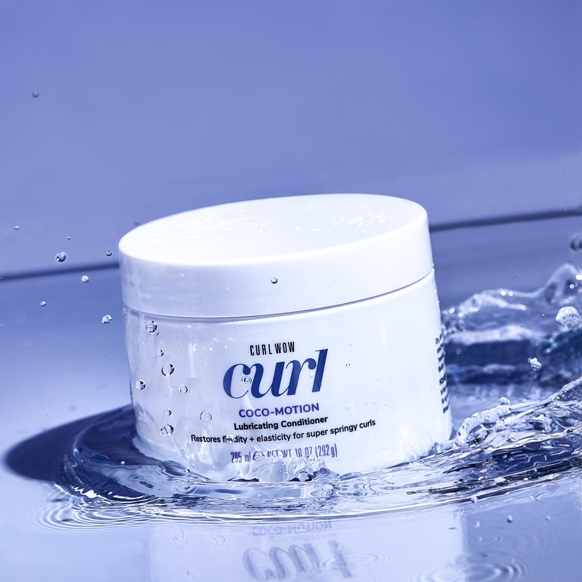 COLOR WOW conditioner texture close-up displaying creamy slip and moisturizing benefit