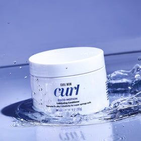 COLOR WOW conditioner texture close-up displaying creamy slip and moisturizing benefit