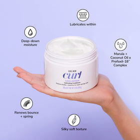 COLOR WOW product on hand demonstrating creamy consistency and easy spread benefit