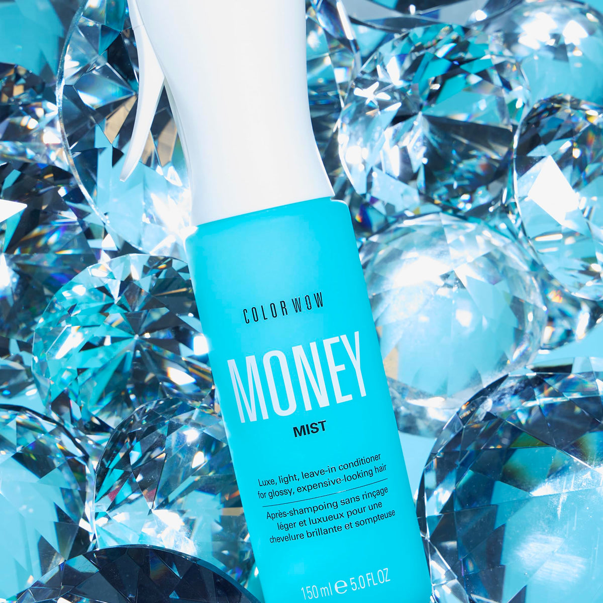 COLOR WOW spray mist being dispensed for easy detangling benefit