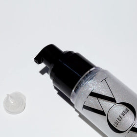 COLOR WOW bottle next to ruler for size comparison and travel-friendly benefit