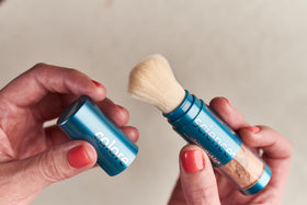 Colorescience brush-on shield bronze brush open close-up showing easy application