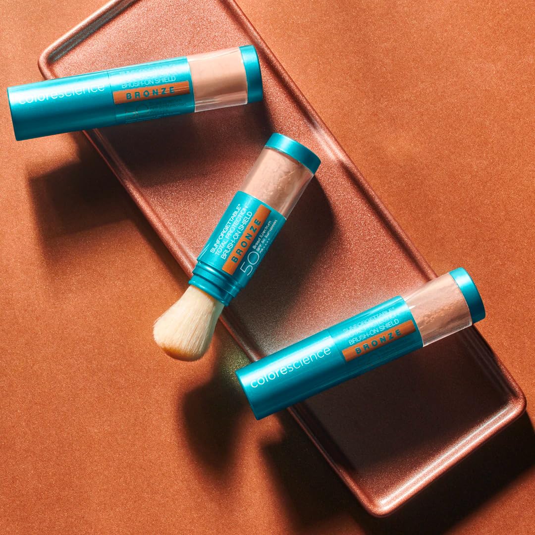 Colorescience brush-on shield bronze swatch on skin showing warm bronzed finish