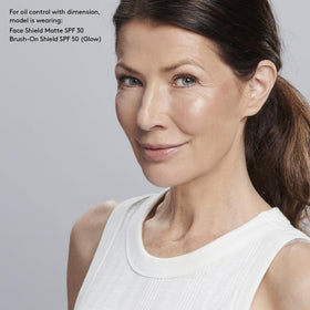 Colorescience applied to neck and décolleté for even sun protection