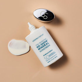 Colorescience product applied to hand demonstrating invisible coverage and quick absorption