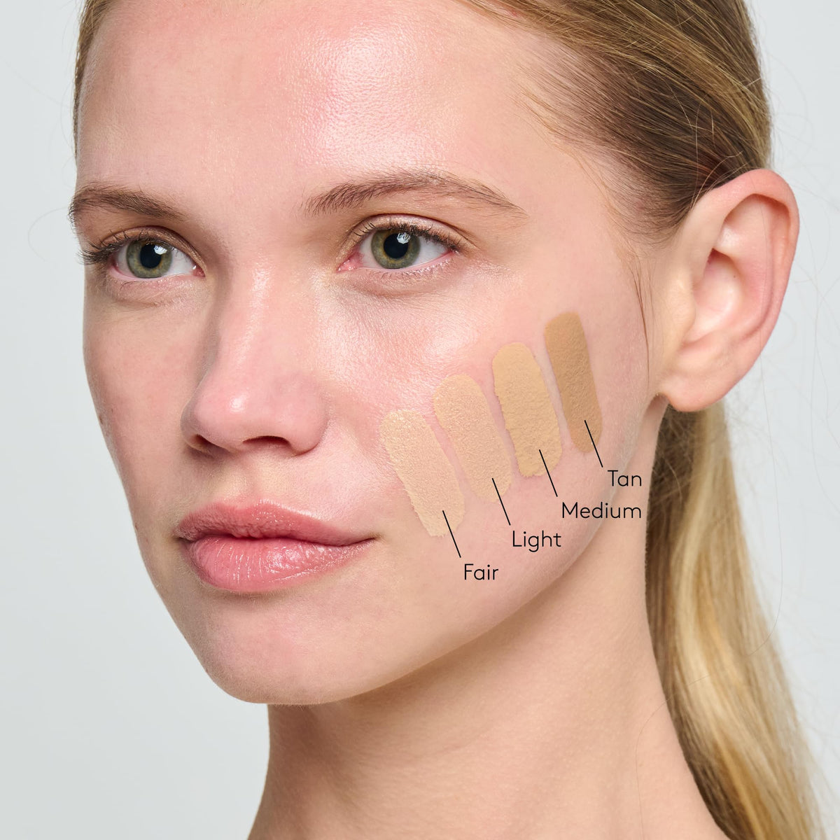 Colorescience open tube dispensing white cream ready to activate for customized coverage