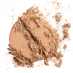 Close-up of Colorescience pressed powder texture highlighting smooth, blendable finish benefit