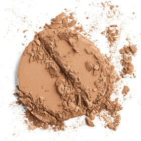Colorescience close-up of pressed powder texture highlighting smooth, blendable finish benefit
