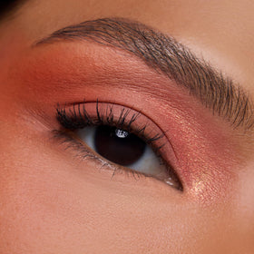 ColourPop baby got peach pressed glitter close-up demonstrating sparkle adhesion benefit