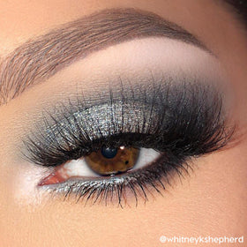Application with brush using ColourPop shades producing a seamless smokey eye