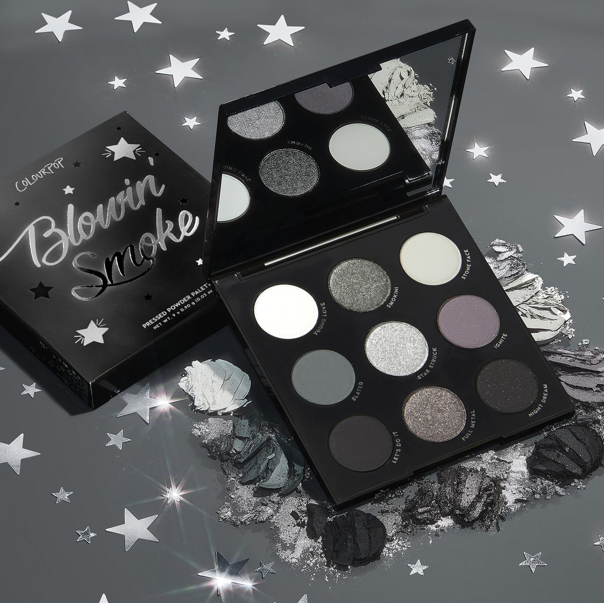 Hand holding ColourPop palette to show compact size and travel-friendly scale