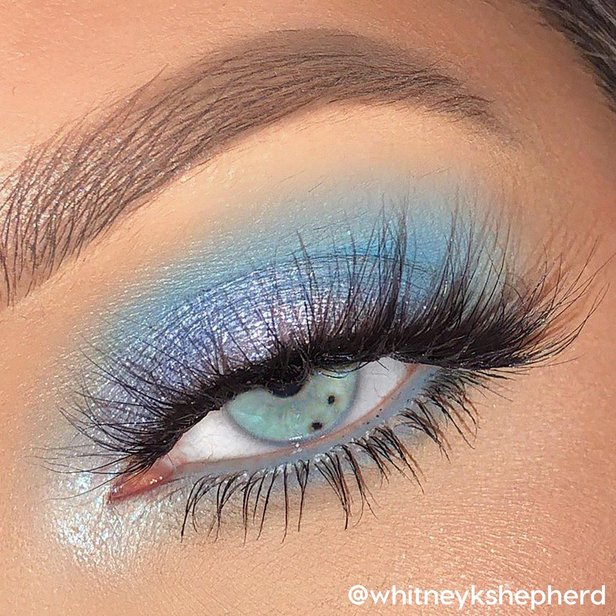 ColourPop worn on eye demonstrating blendable blues and dramatic finish