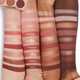 Eyeshadow brush applying ColourPop shimmer to lid demonstrating strong payoff and control