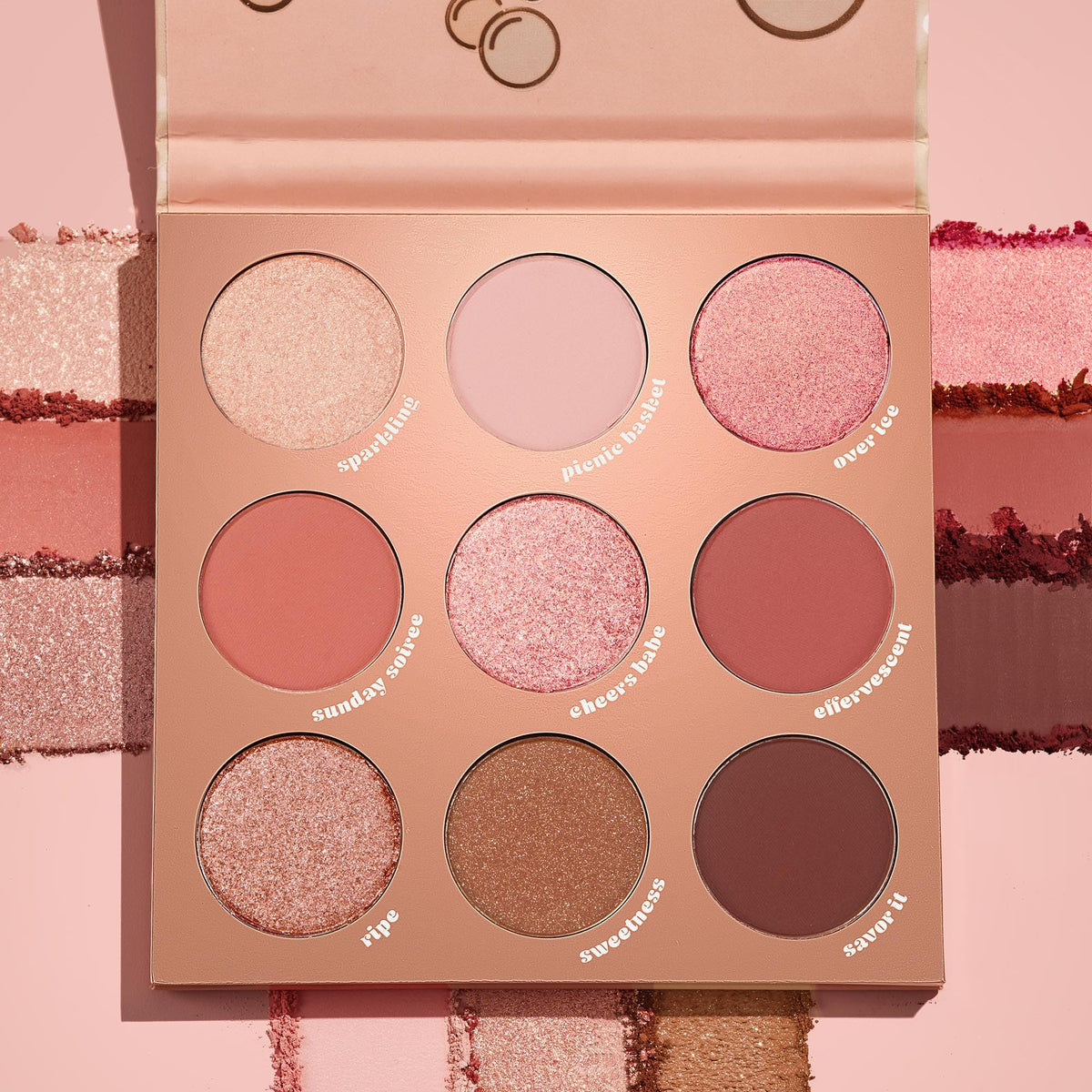 Close-up of ColourPop pans highlighting metallic shimmer and matte depth for precise application