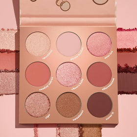 Close-up of ColourPop pans highlighting metallic shimmer and matte depth for precise application