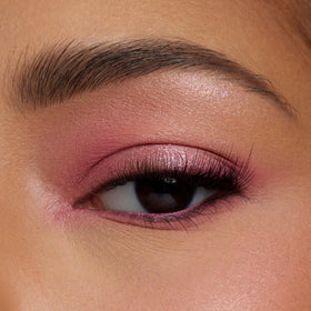 ColourPop Cloud Spun held in hand to show scale, compact travel-friendly benefit