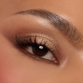 ColourPop metallic swatch catching light to show reflective payoff for lids