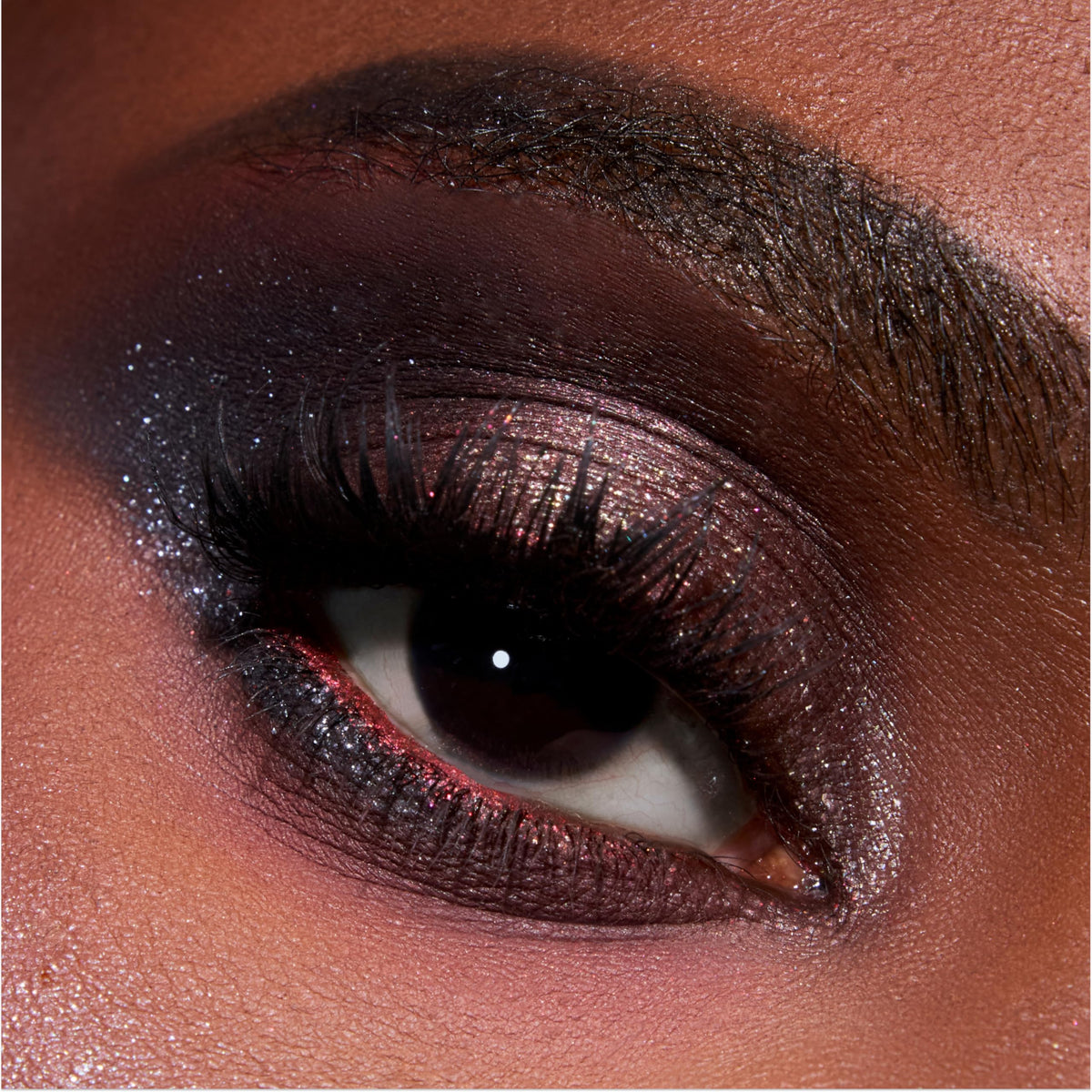 ColourPop applied on eyelid demonstrating even coverage and luminous finish