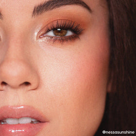 ColourPop close-up swatches on arm showing intense pigment and smooth texture