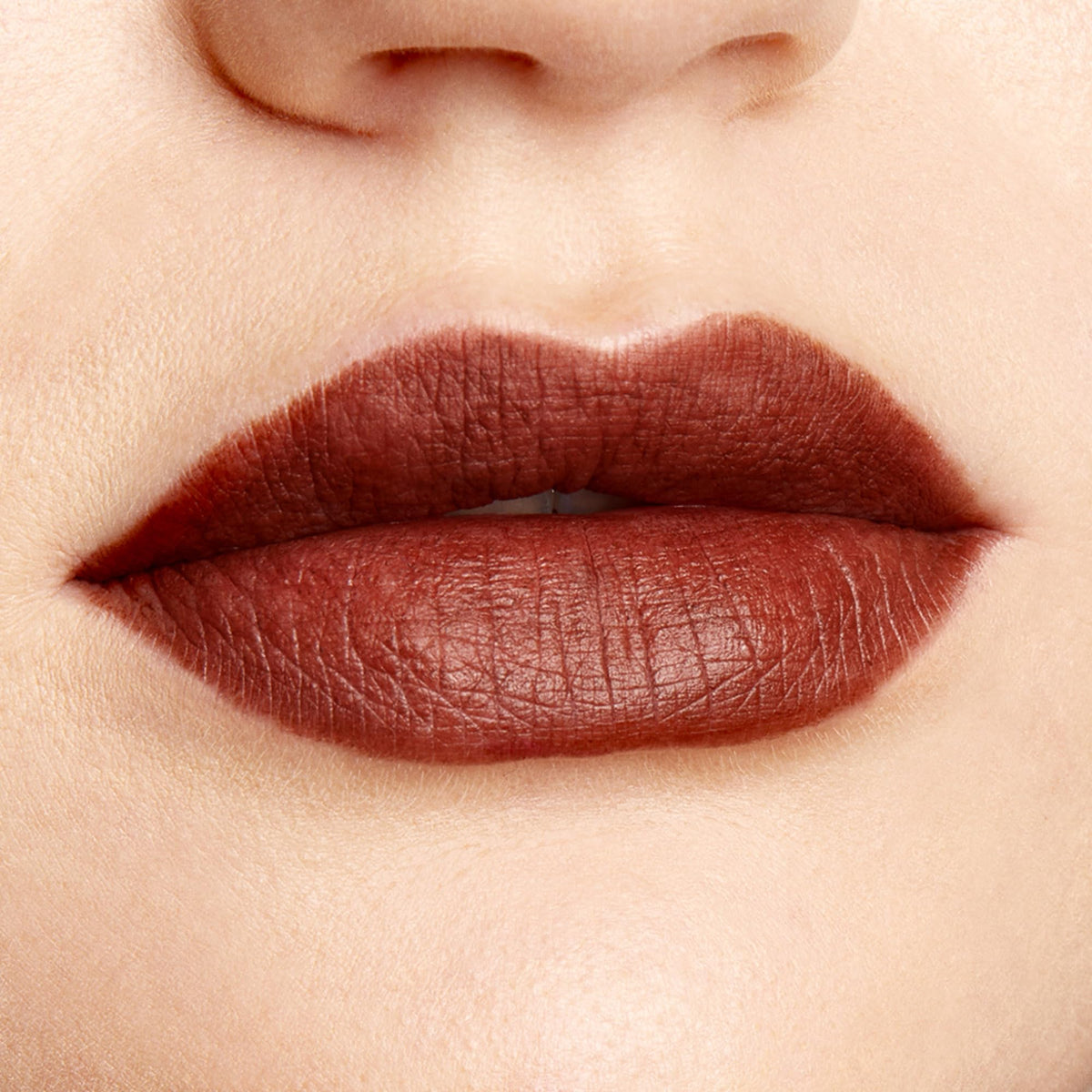 ColourPop lip application close-up showing precise liner and defined pout