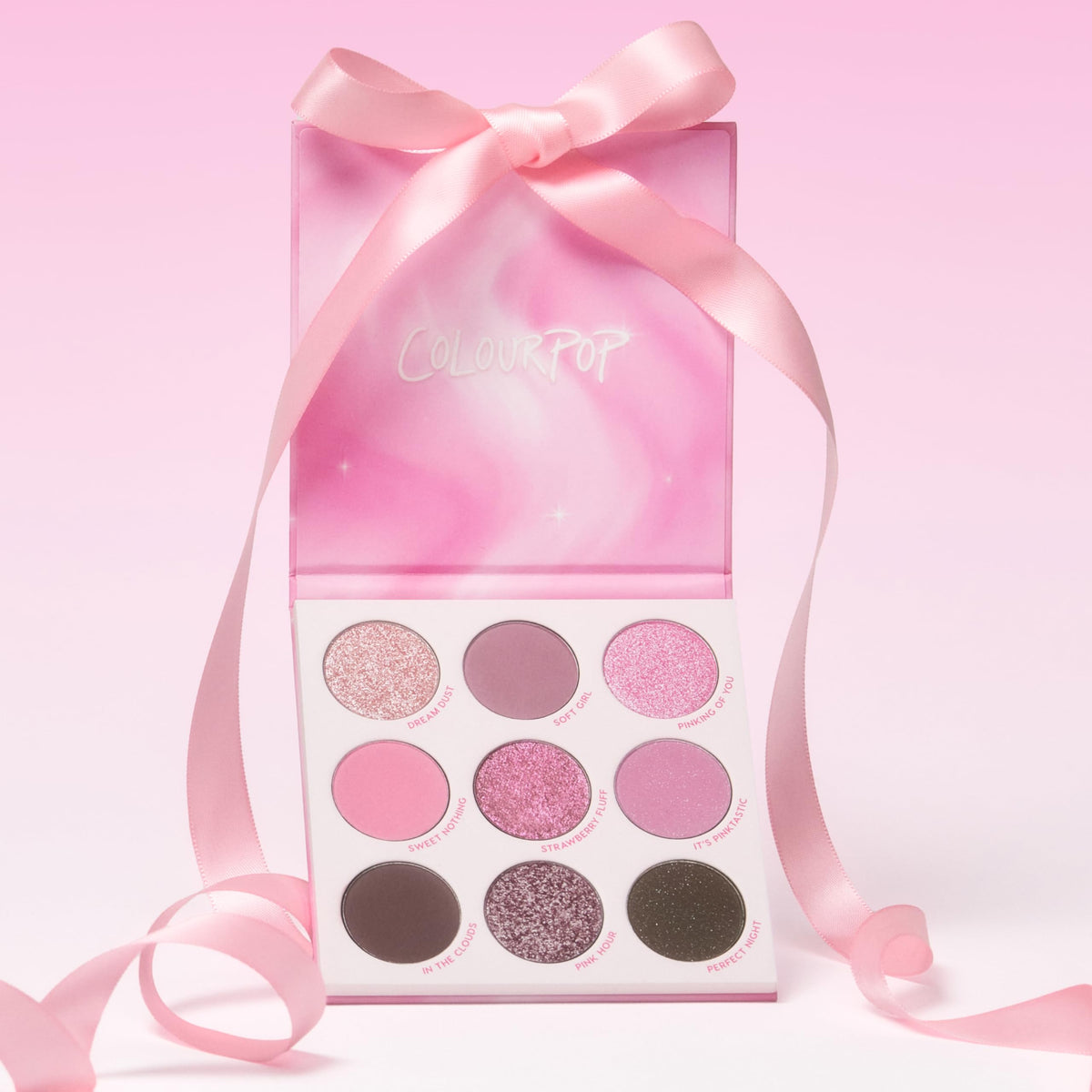 ColourPop on a vanity styled with brushes to inspire everyday pink makeup routines