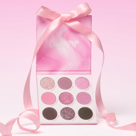 ColourPop on a vanity styled with brushes to inspire everyday pink makeup routines