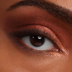 ColourPop flat brush applying metallic shade for high-impact color payoff