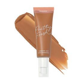 ColourPop tube front view showing compact hydrating skin tint benefit
