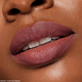 ColourPop swatches on arm showing ten nude shades for true-to-tone shade selection