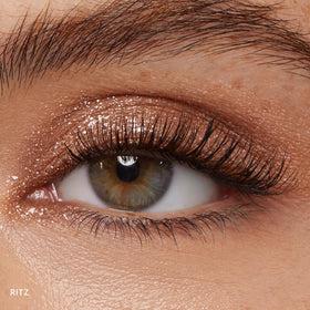 ColourPop Ritz swatch close-up showing sheer nude shimmer and one-swipe payoff