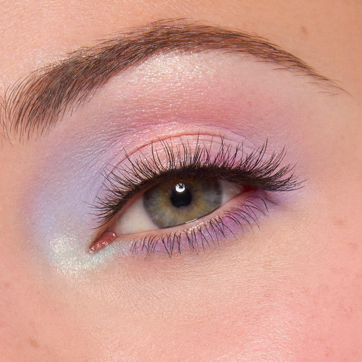 ColourPop worn on model lid demonstrating blendability and color impact