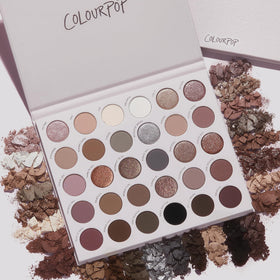 ColourPop palette in hand for scale showing compact travel-friendly benefit