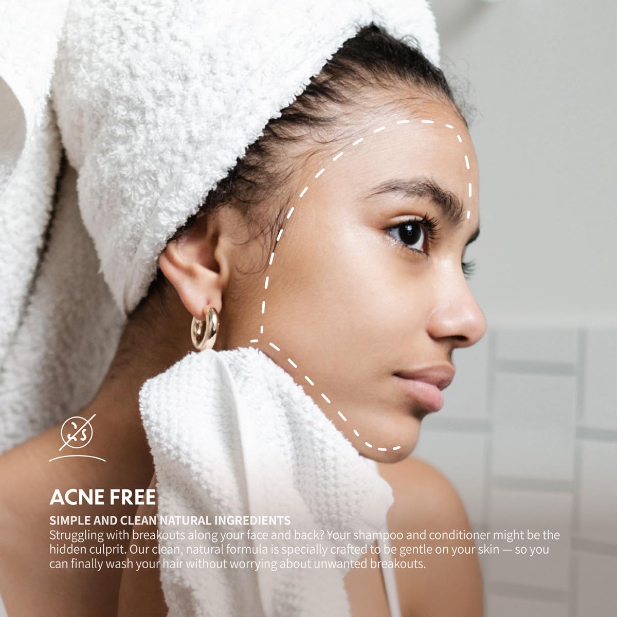 Common Ground shampoo in shower being massaged into roots for lift benefit