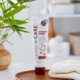 ConvaTec Medline Remedy tube beside ruler showing 4 oz tube size for supply planning