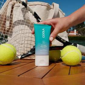 COOLA dermatologist tested badge indicating skin compatibility and safety