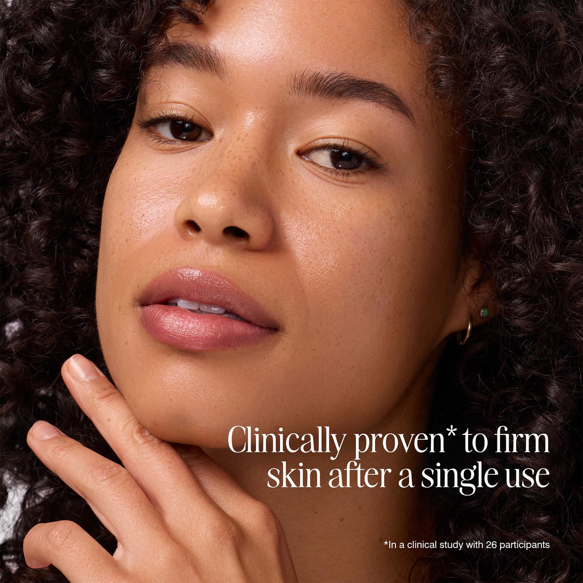 COOLA firming face oil applied on hand demonstrating sheer finish and hydration benefit