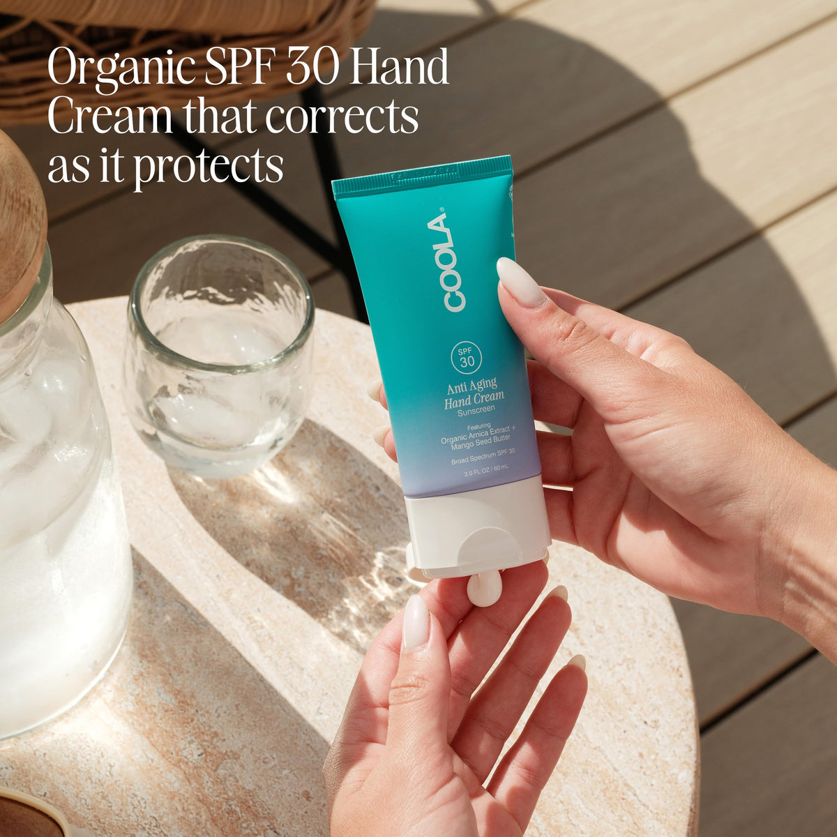 COOLA cream texture close-up showing rich, non-greasy hydration